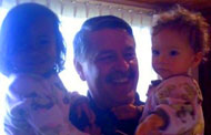 Jose Ricardo Cabrera and his grandchildren